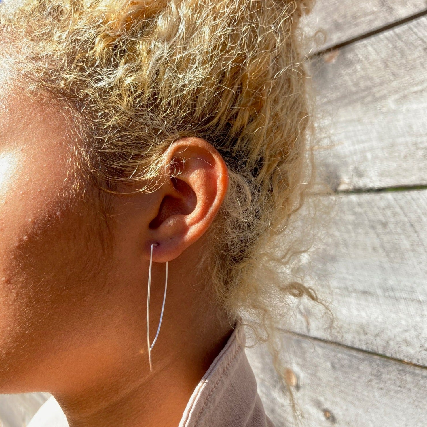 Delicate and graceful these sterling silver wires slide easily through the ear and are lightweight to wear.