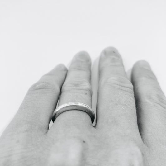 The smooth clean tapered lines define this contemporary yet classic ring. Beautiful on its own or in a stack. 