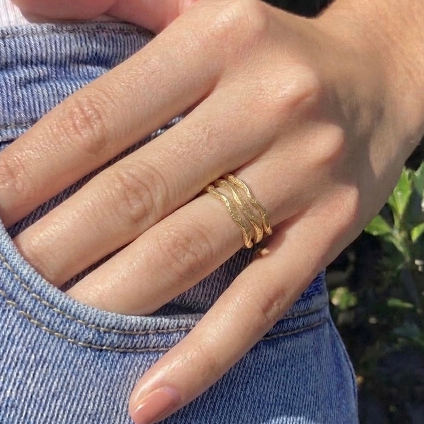 Gold handsculpted wavy stacking rings